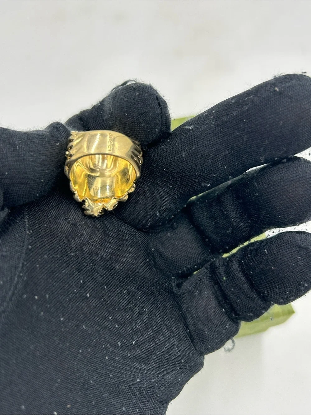 Unisex Gucci, Lionhead motif  gold tone with red crystal size 8.5 made in Italy